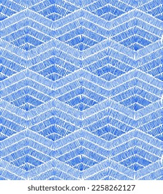 Embroidered seamless pattern. Bohemian zigzag print. Vector illustration.