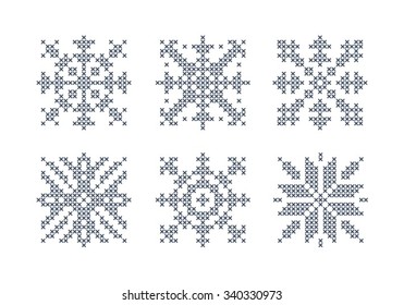 Embroidered snowflake. Vector set of snowflakes. Blue snowflakes on a white background. Norwegian design. Scandinavian design. Slavic design. Cross stitch scheme 1.1