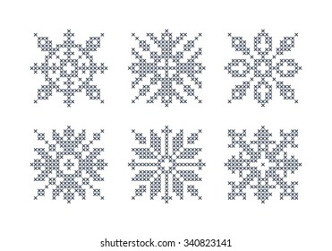 Embroidered snowflake. Vector set of snowflakes. Blue snowflakes on a white background. Norwegian design. Scandinavian design. Slavic design. Cross stitch scheme 2.1