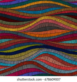 Embroidered wavy seamless pattern. Colorful ornament. Ethnic and tribal motifs. Prints for textiles. Vector illustration.