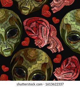 Embroidery. Alien head and anatomical human heart, seamless pattern. Pop culture style, science fiction art. UFO, paleocontact concept. Funny template for clothes 