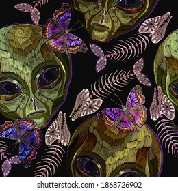 Embroidery. Alien head, butterflies and fish bone, seamless pattern. Pop culture style, gothic art. UFO concept. Funny template for clothes 