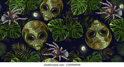 Embroidery. Alien head, tarantula spider, moon and palm leaves, seamless pattern. Night tropical forest. Pop culture style, science fiction art. UFO, paleocontact concept. Funny template for clothes 