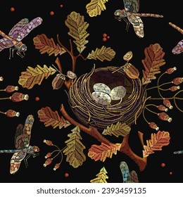 Embroidery. Autumn leaves, bird nest and colorful dragonflies. September forest art. Fall nature style. Seamless pattern. Fashionable template for design of clothes