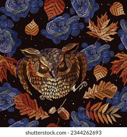 Embroidery. Autumn leaves, clouds and magical forest owls. September. Fall forest nature style. Seamless pattern. Fashionable template for design of clothes