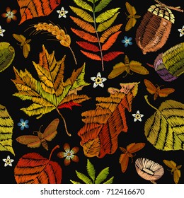 Embroidery autumn seamless pattern. Classical september embroidery autumn leaves, butterfly, acorns wild forest, oak and maple leaves. Fashionable template for design of clothes, t-shirt design 