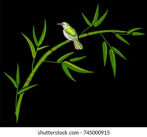 Embroidery bamboo and bird. Stalk with green leaves.