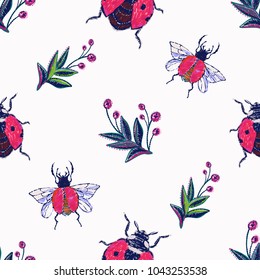 Embroidery berry branches and ladybug insect patch. Fashion patches with summer wild nature illustration embroideries. Seamless pattern backdrop. Trendy art with insects on white background.