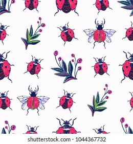 Embroidery berry branches and ladybug insect patch. Fashion patches with summer wild nature illustration embroideries. Seamless pattern backdrop. Trendy art with insects on white background.