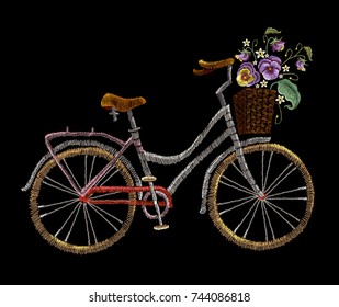 Embroidery bicycle with basket flowers. Fashionable embroidery bicycle on white background, spring art, template for romantic clothes, t-shirt design 