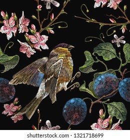 Embroidery birds, blossoming cherry and grapes seamless pattern. Spring fashion pattern, template for design of clothes, t-shirt design 