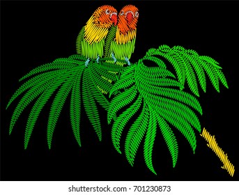 Embroidery birds isolated on black. Couple of parrots sitting on the palm tree.