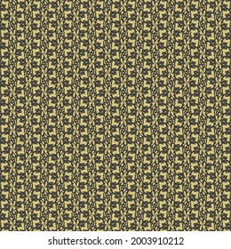 Embroidery with black thread on beige support, made of small ornamental elements and signs arranged in a vertical line. Fashion pattern.