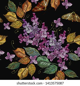 Embroidery blossoming lilac flowers and autumn leaves seamless pattern. Fashion template for clothes, textiles, t-shirt design 