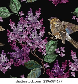 Embroidery blossoming lilac flowers and bird seamless pattern. Fashion template for clothes, textiles and t-shirt design. Spring floral art