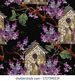 Embroidery blossoming lilac flowers bouquet and wooden bird house. Seamless pattern. Spring background. Fashion template for clothes, textiles 