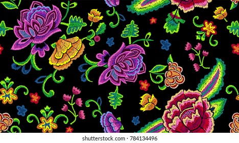 Embroidery botanical seamless pattern with colorful simplify flowers. Vector embroidered floral repeat patch for clothing design.