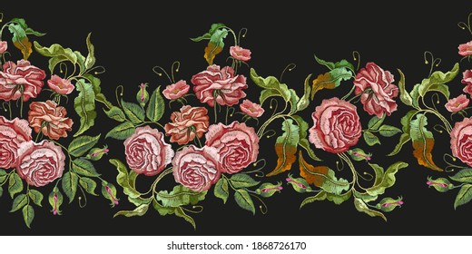 Embroidery buds of red roses on black background. Horizontal seamless pattern. Fashionable template for design of clothes, t-shirt design, tapestry flowers renaissance style 