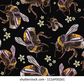 Embroidery bumblebees and flowers seamless pattern. Template for design of clothes, t-shirt design 