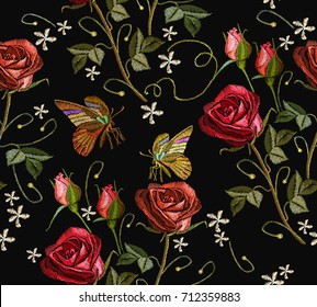 Embroidery butterfly and roses seamless pattern. Beautiful butterfly and red roses classical embroidery seamless background. Template clothes, textiles, t-shirt design