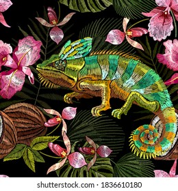 Embroidery chameleon and  tropical orchids paradise flower, seamless pattern.Tropical template for clothes, textiles, t-shirt design