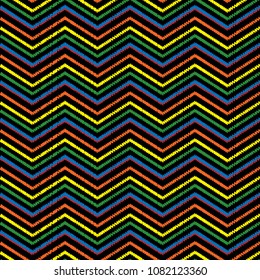 Embroidery chevrons zigzag seamless pattern. Vector abstract geometric background. Tapestry stripes, zigzag lines, tribal style chevron ornament. Embroidered colorful design for fabric, textile