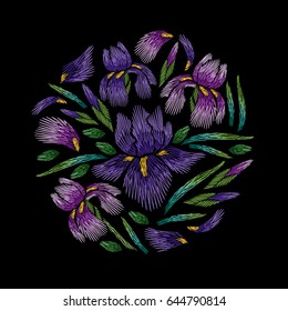 Embroidery circle floral pattern with iris on black background. Vector fashion ornament