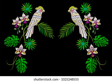 Embroidery cockatoo parrots in the jungle, palm leaves and tropical flowers.