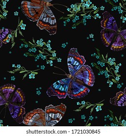 Embroidery. Colorful butterflies and green meadow flowers. Seamless pattern. Summer garden art. Template for clothes, textiles, t-shirt design 