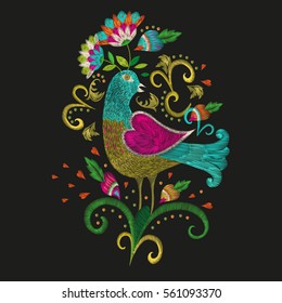 Embroidery colorful ethnic floral pattern for neckline. Vector traditional folk bird with flowers ornament on black background for fashion design