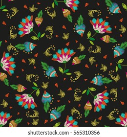 Embroidery colorful ethnic floral seamless pattern with hearts. Vector traditional folk exotic flowers and beetroots ornament on black background.