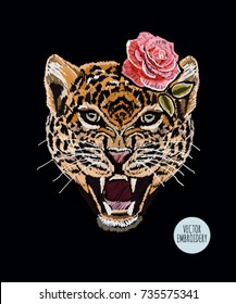 Embroidery colorful floral pattern background  with rose, leopard. Vector traditional folk fashion ornament on black background.
