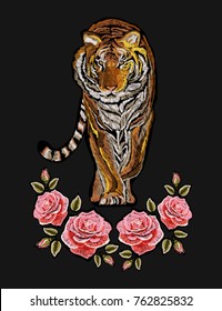 Embroidery colorful floral pattern and roses  tiger  Vector traditional folk fashion ornament black background 