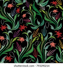 Embroidery colorful floral seamless pattern. Tapestry vector background with vintage grunge embroidered flowers, swirl green leaves, line art tracery ornaments. Luxury design for wallpapers, fabric