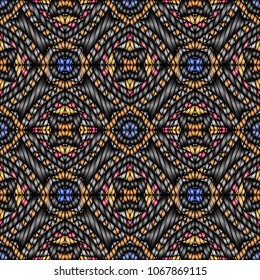 Embroidery colorful pattern with geometric ornament.