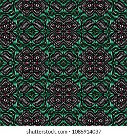 Embroidery colorful pattern with geometric ornament.