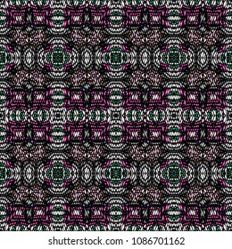 Embroidery colorful pattern with geometric ornament.