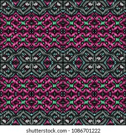 Embroidery colorful pattern with geometric ornament.