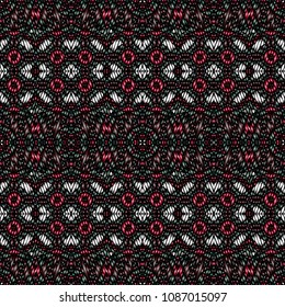 Embroidery colorful pattern with geometric ornament.