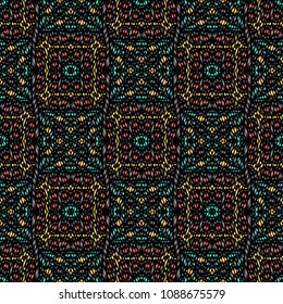 Embroidery colorful pattern with geometric ornament.