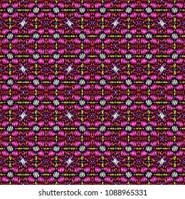 Embroidery colorful pattern with geometric ornament.
