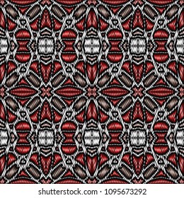 Embroidery colorful pattern with geometric ornament.