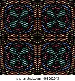 Embroidery colorful pattern with geometric ornament.