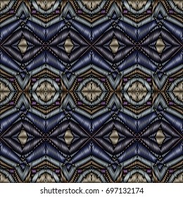 Embroidery colorful pattern with geometric ornament.