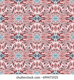Embroidery colorful pattern with geometric ornament.