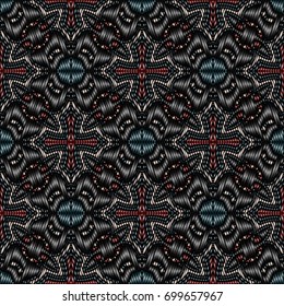 Embroidery colorful pattern with geometric ornament.