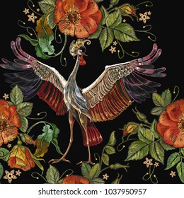 Embroidery crane birds and roses seamless pattern. Template for clothes, textiles, t-shirt design. Classical embroidery, Japanese cranes and red buds of roses art pattern 