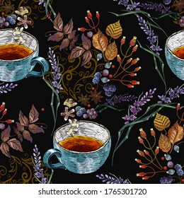 Embroidery cup of tea, lavender flowers and autumn leaves. Fall garden template of clothes, tapestry, t-shirt design. Seamless pattern 