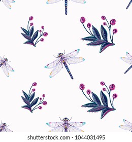 Embroidery decorative branch and beautiful dragonfly patch. Fashion patches with summer wild nature illustration embroideries. Seamless pattern backdrop. Trendy traditional art on white background.