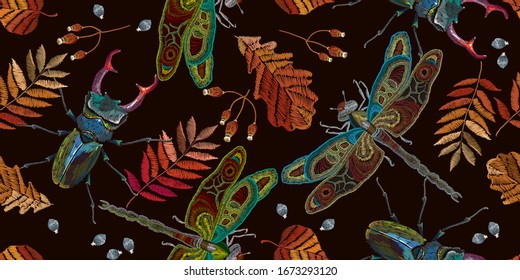 Embroidery. Dragonflies, autumn leaves and beetle deer, seamless pattern. Template for clothes. Fashion design. Insects art 